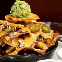 Mini Nachos · Corn Tortilla Chips Covered with Melted Cheese, Jalapeños, Red Chile Sauce, Green Onion and ...