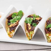 Asian Short Rib Tacos · Three Mini Corn Tortillas Filled with Grilled Marinated Kogi-Style Short Rib, Housemade Kore...