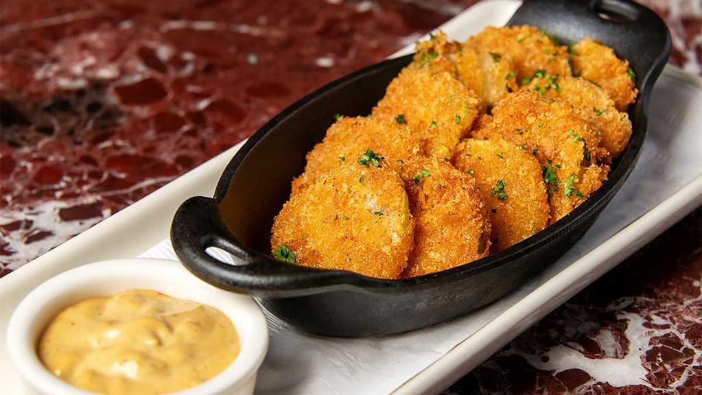 Fried Pickles · Crispy Slices Served with Our Dipping Sauce