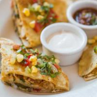 Stacked Chicken Quesadilla · Tortillas Layered with Melted Cheese, Chicken, Tomato, Black Beans and Green Chiles. Served ...