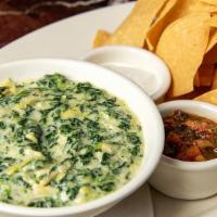 Creamy Spinach & Cheese Dip · Combined with Artichoke Hearts and Served with Crisp Tortilla Chips and Salsa