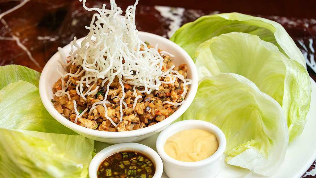Chicken Lettuce Wraps · Minced Sauteed Chicken Breast and Vegetables in a Delicious Asian Sauce. Served with Cool Lettuce Wraps