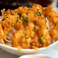 Volcano Shrimp · Light and Crispy Fried Shrimp Drizzled with a Spicy Chili Aioli