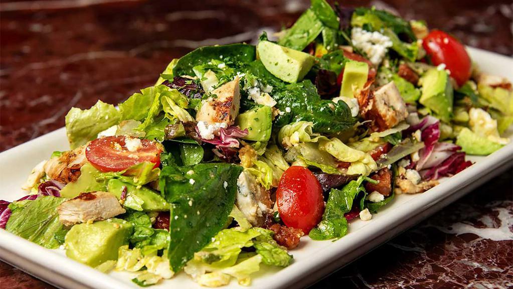Chopped Salad · Grilled Chicken, Bacon, Tomato, Blue Cheese, Avocado, Egg and Greens Tossed in Our Vinaigrette