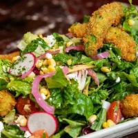 Crispy Avocado Salad · Mixed Greens, Tomato, Corn, Red Onion, Radish, Feta Cheese, Tortilla Strips and Honey-Lime D...