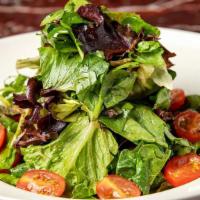 House Green Salad · Mixed Greens and Tomatoes Tossed in Our Roasted Tomato-Caramelized Onion Vinaigrette