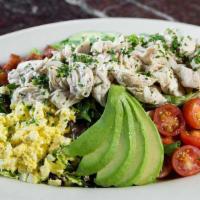 Grand Cobb Salad · A Top Shelf Cobb Salad with Chicken, Bacon, Avocado, Tomatoes, Blue Cheese and Grated Egg To...