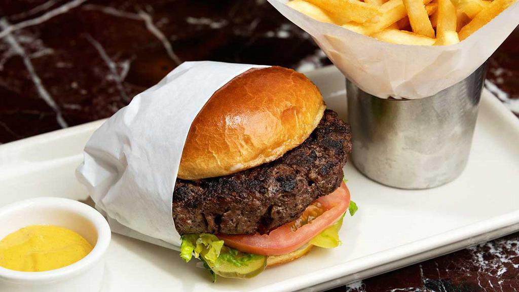 Delux Drive-In Burger™ · Chargrilled with Lettuce, Tomato, Onion, Pickles and Mayonnaise