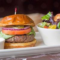 The Chop House Burger · A Large Premium Certified Angus Beef ® Prime Burger.