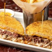Grand Lux Burger Melt™ · Our Burger on Grilled Parmesan Cheese Bread with Lots of Cheddar Cheese, Grilled Onions and ...