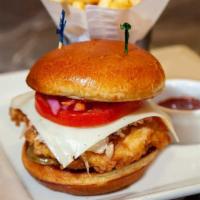 Crispy Chicken Sandwich · Crispy Fried Chicken, Fontina Cheese, Coleslaw, Tomato, Onion, Pickles and Calabrian Chile A...