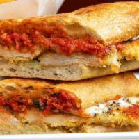 Chicken Parmesan Sandwich · Tender Chicken Lightly Coated in Parmesan Breadcrumbs with Lots of Melted Mozzarella and Par...