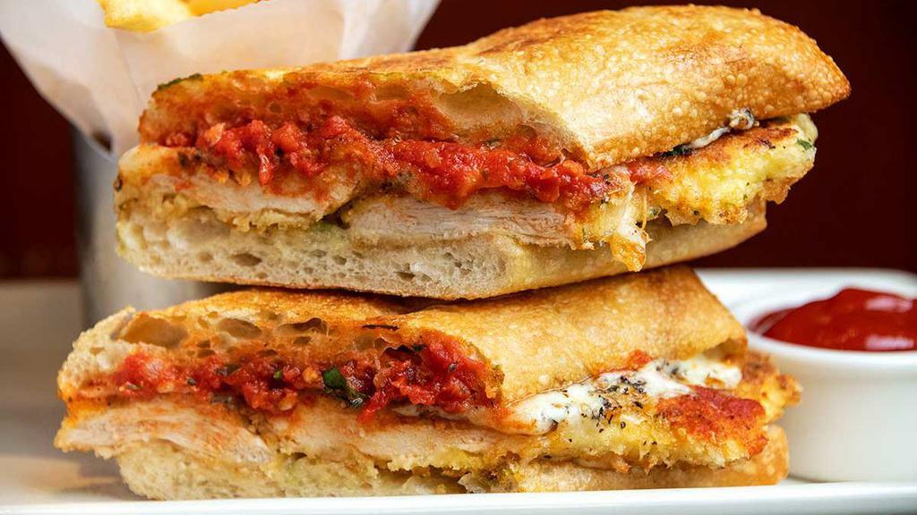 Chicken Parmesan Sandwich · Tender Chicken Lightly Coated in Parmesan Breadcrumbs with Lots of Melted Mozzarella and Parmesan Cheese and Marinara Sauce on Grilled Ciabatta Bread