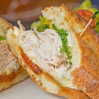 Roast Turkey And Brie Sandwich · Oven Roasted Turkey on a Roll with Brie Cheese, Fresh Apple, Sun-Dried Cherries and Apricots...