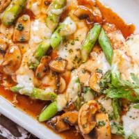 Madeira Chicken · Sauteed Chicken Breast Topped with Asparagus, Mozzarella and Our Fresh Mushroom-Madeira Sauc...