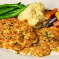Chicken Royale · Lightly Breaded Sauteed Chicken Breasts Served over a White Wine Butter Sauce with Mashed Po...