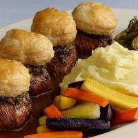 Cafe Beef Wellington · Filet Mignon Steak Medallions Covered with Crimini Mushrooms and Topped with Warm Puff Pastr...