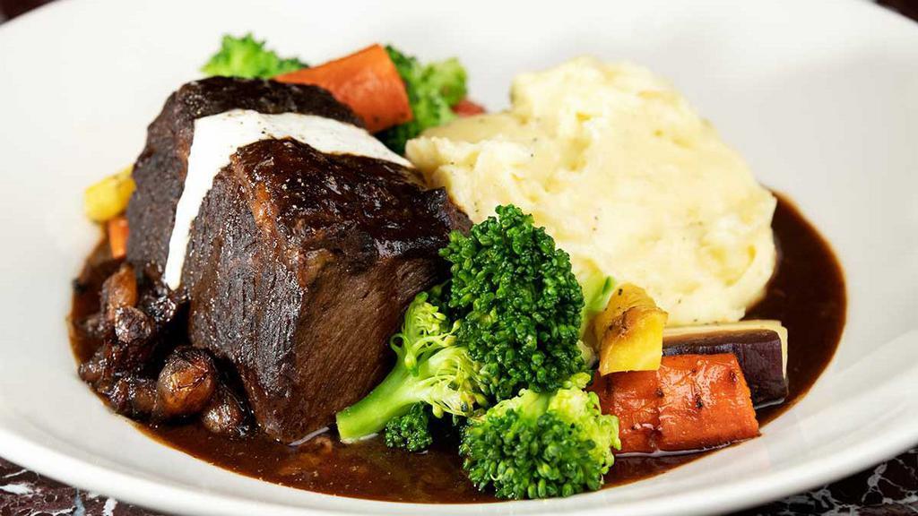 Braised Pot Roast · Cooked Low and Slow Until Perfectly Tender. Served with Mashed Potatoes, Vegetables and Horseradish Sauce