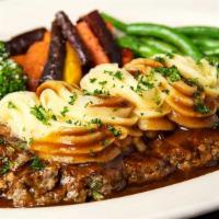 Salisbury Steak · Chopped Sirloin Combined with Onions, Mushrooms and Garlic. Served with Mashed Potatoes, Bro...