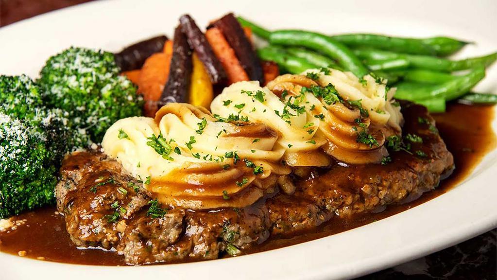 Salisbury Steak · Chopped Sirloin Combined with Onions, Mushrooms and Garlic. Served with Mashed Potatoes, Brown Gravy and Fresh Vegetables