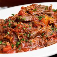 Sunday Night Pasta · Made Fresh Every Day! A Rich Slow-Simmered Meat Sauce with Chunks of Beef Short Rib, Ground ...