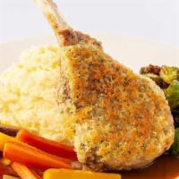 Parmesan Crusted Pork Chop · Thick-Cut Pork Chop Topped with Garlic Buttered Breadcrumbs, Parmesan Cheese and Fresh Herbs...