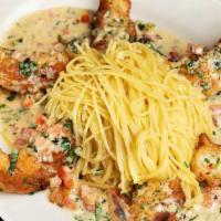 Shrimp Scampi · Sauteed with White Wine, Lemon, Garlic, Fresh Tomato, Basil, Parsley and a Touch of Cream. S...