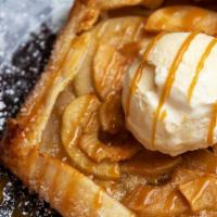 Warm Rustic Apple Pie · Baked when you order it! Flaky Sugared Crust Filled with Fresh Apples and Topped with Vanill...