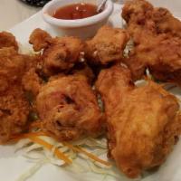 Fried Chicken · House marinated chicken, deep fried until crispy and golden brown served with our housemade ...