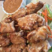 Sa-Tay (Thai B.B.Q Sticks) · Marinated and grilled chicken, beef or pork kebabs served with a peanut dipping sauce. Also ...
