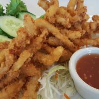 Fried Calamari · Crispy deep fried calamari served with sweet chili sauce.