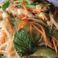 Long Rice Noodle Salad (Yum Woon Sen) · Glass noodles tossed with lettuce, onions, tomatoes, cilantro, mint, and lime juice. With yo...