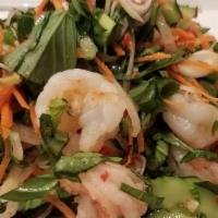 Basil Shrimp Salad · Fresh cucumber, basil, onion, and carrot tossed together spicy lime dressing. Topped with cr...