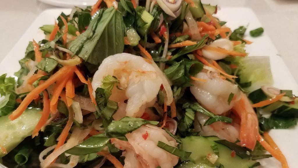 Basil Shrimp Salad · Fresh cucumber, basil, onion, and carrot tossed together spicy lime dressing. Topped with crushed toasted peanuts.