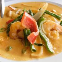 Panang Curry · Famous Bangkok peanut based curry. Prepared with red and green bell peppers, long bean, onio...