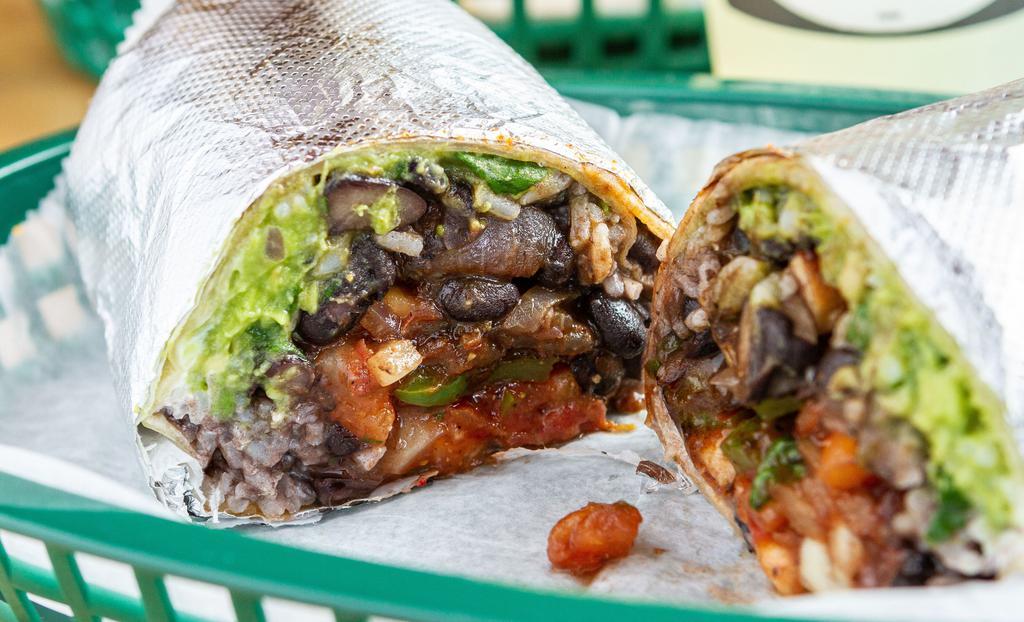 Carne Fajita Burrito · Grilled marinated chicken, rice, black beans, fajita seasoned peppers and onions, sour cream, guacamole,and pico de gallo, served in a flour tortilla