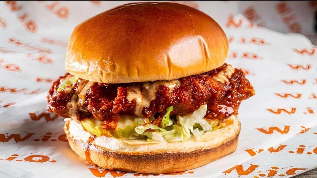 Nashville Hot Chicken · Crispy buttermilk chicken coated in our Nashville Hot sauce with pickles, lettuce & chipotle ranch dressing.