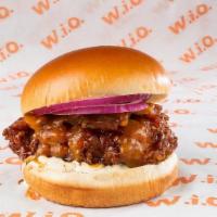Sho-Stopper · Crispy buttermilk chicken coated in our Shogun sauce with cheddar cheese, bacon, red onion a...