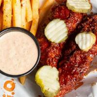 Nashville Hot Tenders Fry Meal · 2 large crispy Nashville Hot-style chicken tenders served w/ pickle chips, chipotle ranch an...