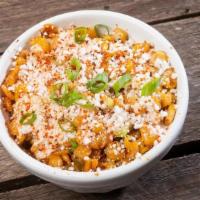 Small Street Corn · Grilled corn off-the-cob jacked up with red onion, jalapenos, scallions, chipotle ranch and ...