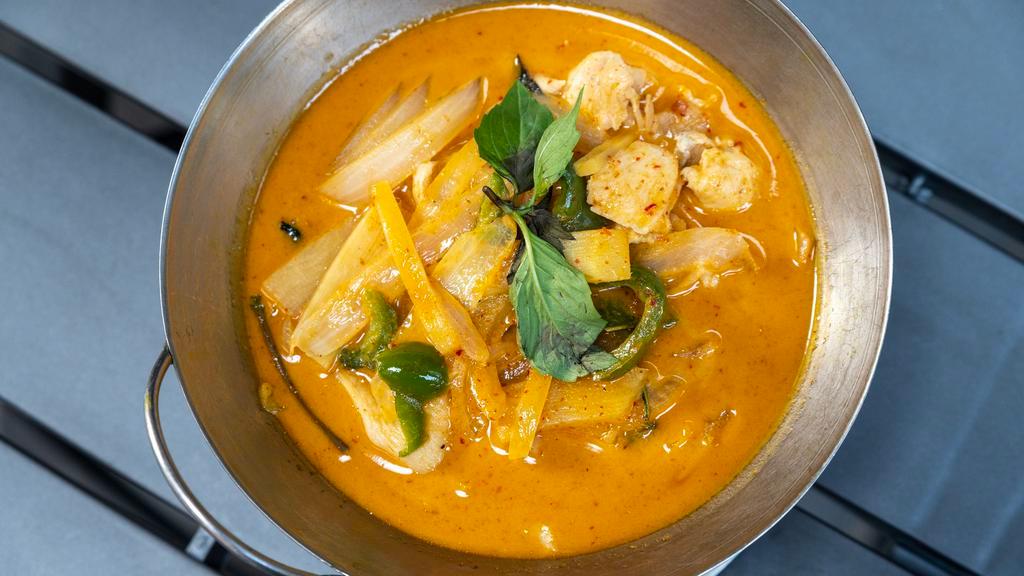 Panang Curry · Chicken or beef with peppers, onions and basil leaves.