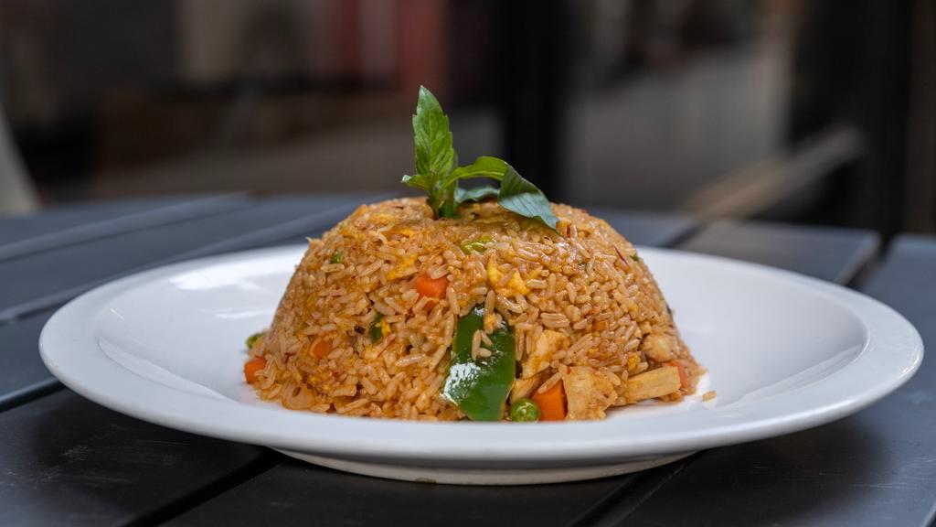Spicy Basil Fried Rice · Chicken or beef fried rice with spicy basil sauce.