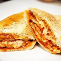 Chicken Parmesan · homemade chicken cutlet and marinara sauce, topped with melted mozzarella on a toasted 1/2  ...