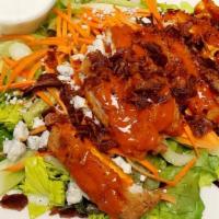 Buffalo Chicken Salad · crispy breaded chicken tossed in buffalo sauce, crumbled bacon, tomatoes, celery, carrots, o...