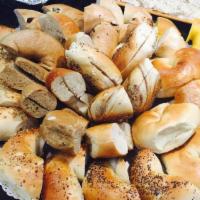 Bagels Dozen (Assorted) Bundle · Please choose bagel types and mention the note to kitchen. Served with your choice of Coca-C...