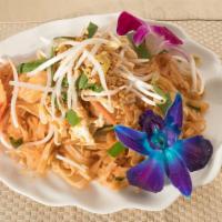 Pad Thai · All time flavored Thai rice noodles with tofu, egg, bean sprouts, ground peanuts and tamarin...