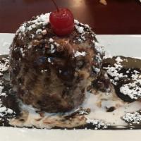 Fried Ice Cream
 · Coated with shredded coconut, served with caramel and chocolate sauce