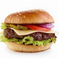 Beef Burger · Juicy, grilled beef burger with fresh lettuce, tomatoes, pickles, ketchup and mayo on a toas...