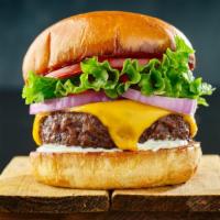 Cheeseburger · Juicy, grilled beef burger and melted American cheese with fresh lettuce, tomatoes, pickles,...