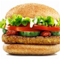 Veggie Burger · Delicious vegetarian patty with fresh lettuce, tomatoes, pickles, ketchup and mayo on a toas...